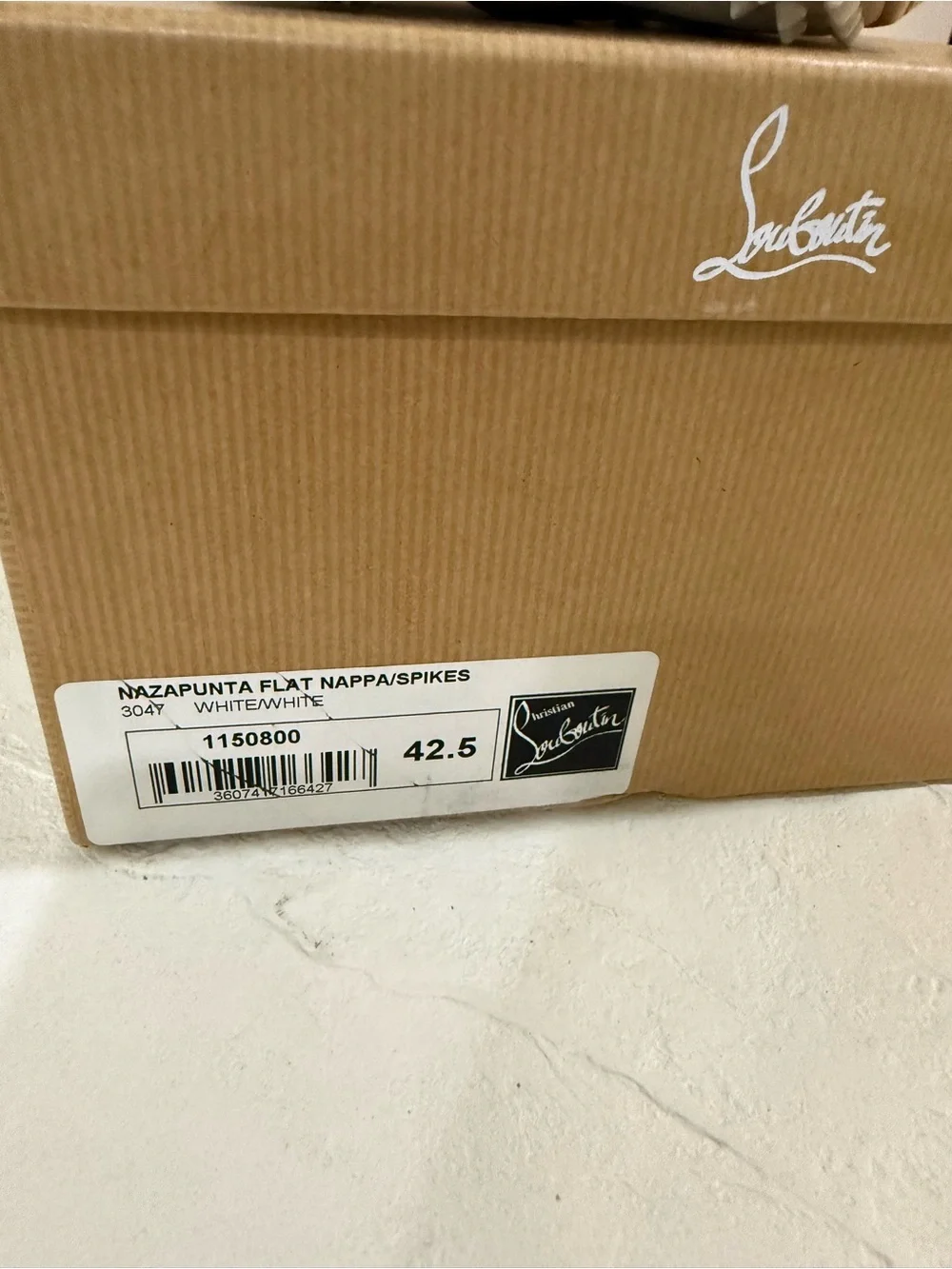 Christian Louboutin Men’s white boat sneaker spikes